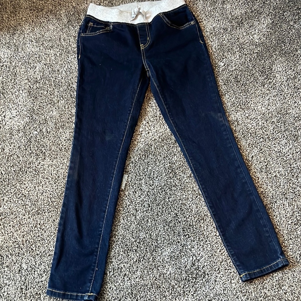 Denim jeans with gray stretchy band